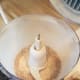 You will need to keep refilling your processor until you have enough onions in there to completely powder the entire mixture.