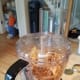 Put the top on and turn on the processor.