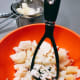 Mash the boiled potatoes.
