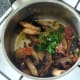 Chopped coriander is last to be added to mushrooms