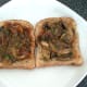 Curried garlic mushrooms are spooned on to hot toast