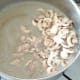 Chicken meat and remaining mushrooms are added to blitzed soup body
