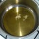 Grated garlic is gently sauteed in olive oil