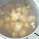 Garlic is added to boiled potatoes and mushrooms