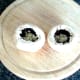 Grated garlic and seasonings are added to mushroom cavities