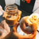 Delicious sugar donut with iced coffee.