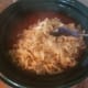 Once noodles are cooked, drain and add them to the crock-pot. Stir.