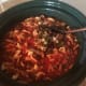 Add sautéd onion and pepper to crock-pot. Stir.
