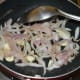 Step one: Heat olive oil in a deep bottomed pan. Throw in chopped onion and garlic. Saute until onions turn pinkish.
