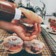 Inject the Nutella into each donut.