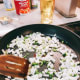 On the other pan, saute the chopped onions with chopped green bell peppers.