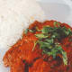 Chicken tikka masala with steamed basmati rice.