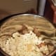 I poured in my milk and minced garlic. You can substitute heavy cream or half-and-half for a thicker, creamier mixture.
