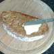Butter is spread on hot toast