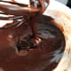 Make the chocolate glaze by using the double boiler technique.