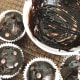 Glaze the muffins with chocolate topping.