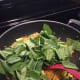 Add the mustard greens.