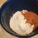Add your flour and sugar to a large mixing bowl.