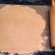 Roll out the dough with wax paper or plastic wrap for easy transfer.