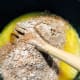 Gradually add the dry mixture into the melted butter.