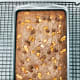Take out the brownies from the oven and let them cool completely before removing from the pan.