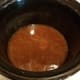 You'll dump your bacon grease straight into your crockpot. If you have some bacon bits stuck to the bottom of your pot, you can pour in a little chicken broth while it's still on the heat and scrape them right out.