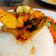 Serve immediately with steamed white rice.