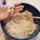 Add enough water to where your dough will stick together when squeezed.