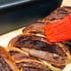 Brush the top with melted butter and honey.