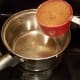 Shown one ingredient at a time. First pour your coconut sugar into your pot.