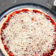 Top the sauce with the shredded cheese.