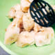 In a medium bowl, mash the bananas.
