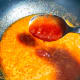 Add two tablespoons of ketchup.