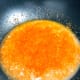 Saute the paste in a wok with the remaining oil.