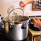 Add to your canner 2 quarts of water, or whatever the manufacturer recommends.