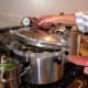 Open canner away from your face, to prevent steam burns!