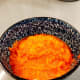 Transfer the paste into a bowl and set aside.