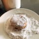 Place confectioners’ sugar and/or some cinnamon sugar, if desired, into a medium bowl. Add donuts a few at a time and toss until coated evenly.