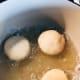 Fry for about 3 minutes on each side or until it puffs and turns golden brown.