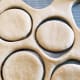 Shape the donuts using a donut cutter.