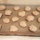 Either roll out and cut or roll into balls with your hands. Lay them out evenly on your cookie sheets.