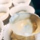 Use an ice-cream scoop to fill each muffin cup.