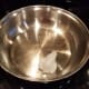 Start by melting your coconut oil in a pan on the stove over medium heat.