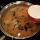 And finally add your milk. Whisk again and then allow to cook and thicken.