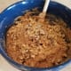 If you wish, mix in half of your nuts, saving the rest for the topping.