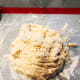 Transfer the mixture onto a baking mat or floured surface.