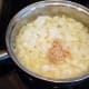 Add your minced garlic and cook with the onions.