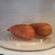 Begin by cooking your sweet potatoes. I chose to cook mine in the microwave for speed, poking fork holes in each of them first for venting.