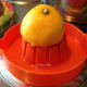 Making lemon juice with a handy juicer.
