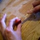 You may have to cut the plums nearly in half, as the seeds are designed to stick tight, so they can ferment in the dropped fruit and plant themselves.